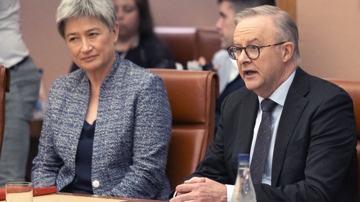 Australia's Minister for Foreign Affairs Penny Wong (L) and Prime Minister Anthony Albanese during a meeting in Parliament House in Canberra, December 7, 2023. 