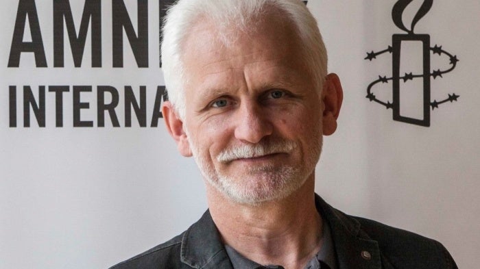 man smiling in a photo