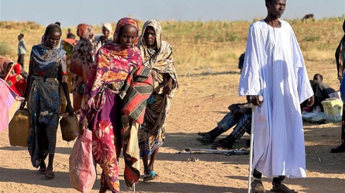 Displaced Sudanese people who fled El-Fasher after the city fell to the Rapid Support Forces (RSF) arrive in the town of Tawila, North Darfur, Sudan, on October 28, 2025.