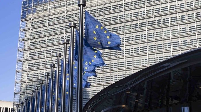 Flags of the Europe waving in front of the Le Berlaymont building, headquarters of the European Commission, in Brussels, Belgium in April 2024.