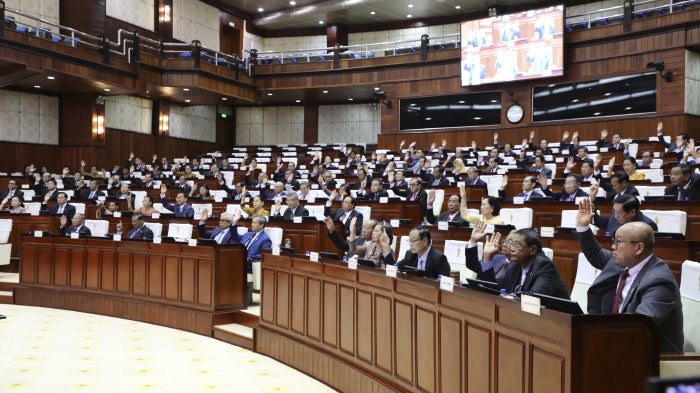 Cambodian lawmakers attend a National Assembly session to consider a draft amendment to the nationality law, Phnom Penh, August 25, 2025.