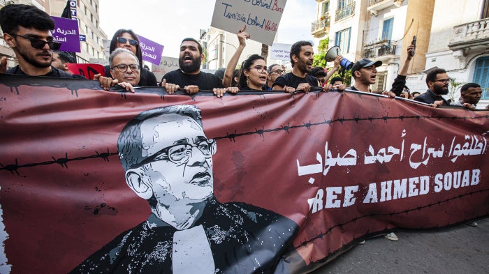 Supporters show support for the lawyer and human rights defender, Ahmed Souab, who was arrested on terrorism-related charges, in Tunis, Tunisia, April 25, 2025.