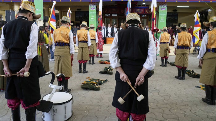 Exiled Tibetan artists observe a minute's silence as they mark the 66th anniversary of an uprising in Tibetan capital Lhasa, at the Tsuglakhang temple in Dharamshala, India, March 10, 2025.