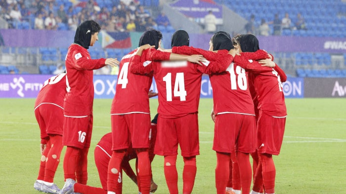 Iranian players huddle before the AFC Women's Asian Cup Australia 2026 football match between Iran and the Philippines on the Gold Coast on March 8, 2026.