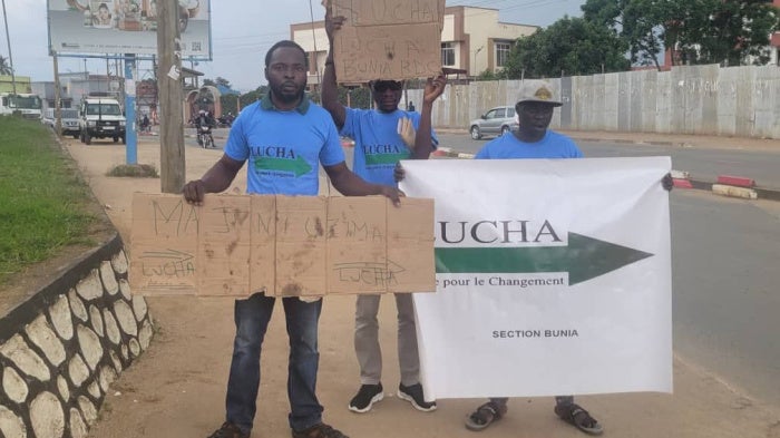 Joachim Paluku Kamate (left), Olivier Sefu Anjisina (center), and Jackson Kambale Odo in Bunia, Democratic Republic of Congo, March 12, 2026. 