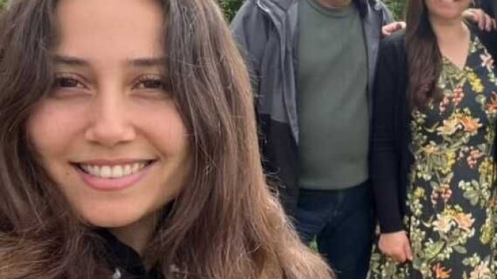 Environmental activist Esra Isik, with her parents.