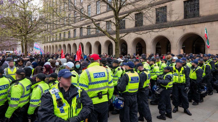 Anti-fascist supporters were kept apart from the Britain First demonstration by police in Manchester, UK, April 18, 2026. 
