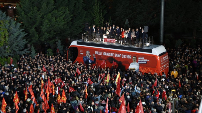 Özgür Özel addresses supporters outside the Republican People's Party (CHP) headquarters in Ankara after a court decision to remove him as party leader, May 21, 2026.