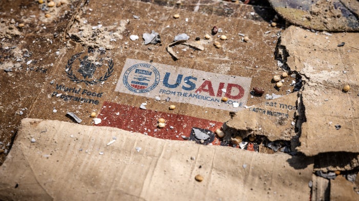 A USAID box amid materials left behind after widespread vandalism and looting following clashes at the World Food Programme warehouse in Bukavu, Democratic Republic of Congo, February 21, 2025.