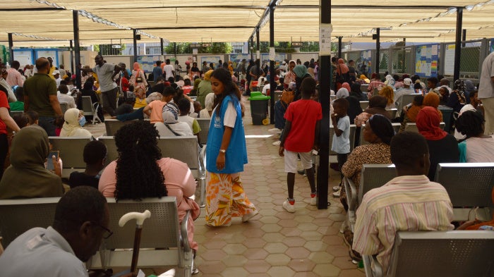 Asylum seekers sit in a UNHCR registration center in Cairo, Egypt on July 25, 2023. 