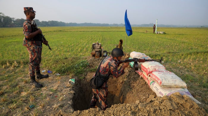 Border Guard Bangladesh personnel stand guard in the Sadipur border area in Benapole, Jessore district, Bangladesh, June 3, 2026. 