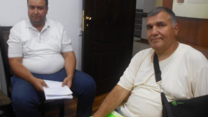 Javokhir Muminov (left) and Djura Akbarov (right) at the Kashkadarya Regional Prosecutor's Office. 