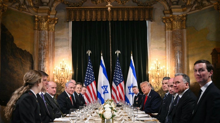 US President Donald Trump (center-right) meets with Israeli Prime Minister Benjamin Netanyahu (center-left) during a bilateral meeting at Trump's Mar-a-Lago residence in Palm Beach, Florida, on December 29, 2025.