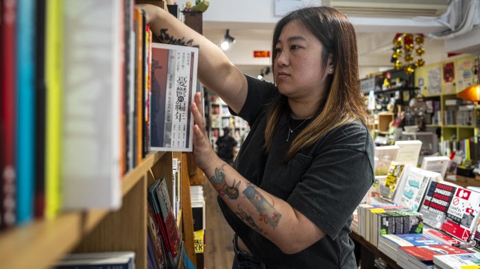 Leticia Wong, a former pro-democracy district councillor, at her bookstore in Hong Kong, June 20, 2025. 