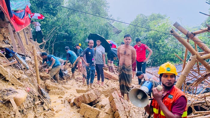 Rescuers work at the site of a landslide at a Rohingya refugee camp in Cox's Bazar, Bangladesh,  July 8, 2026.