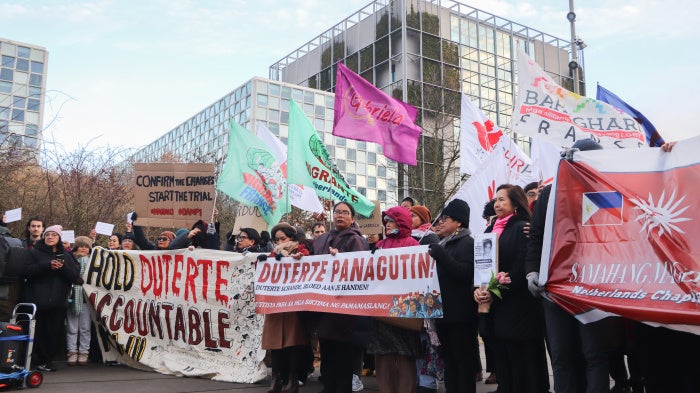 Victims’ families and activists gather outside the International Criminal Court in The Hague to demand justice for the thousands of people killed during the abusive “drug war” of former Philippine President Rodrigo Duterte, February 23, 2026.