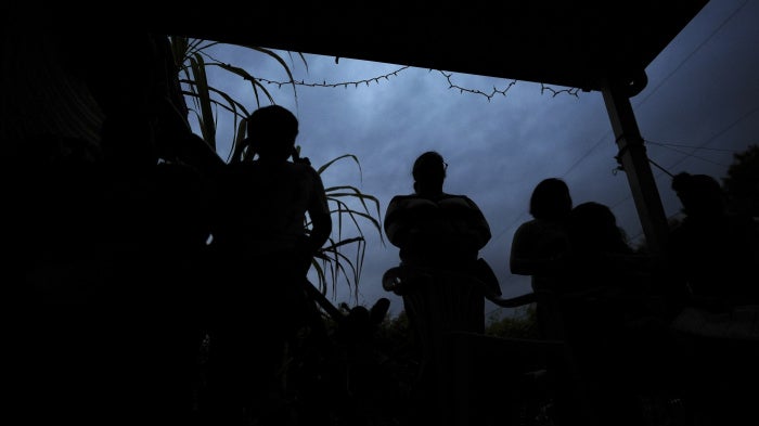 In Homestead, Florida, women and their children listen to an explanation of their legal rights and strategies for preparing their families if a parent is detained or deported,  January 17, 2025.