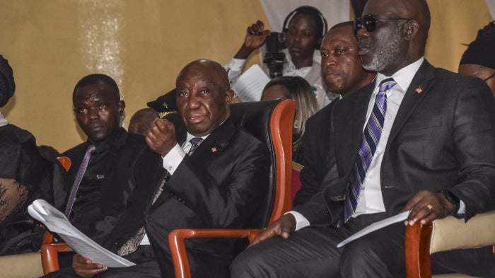 Liberian President Joseph Boakai (second from the left) and Liberian Speaker for the House of Representatives Richard Nagbe Koon (right) in Zwedru on June 27, 2025. 