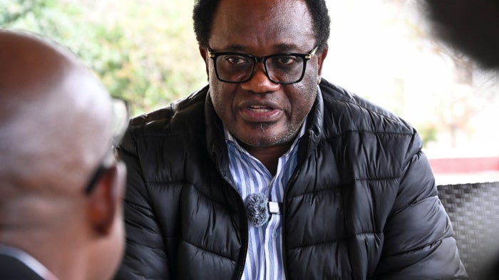 Zambian opposition leader and National Reconciliation Party for Unity and Prosperity (NRPUP) presidential candidate Brian Muntayalwa Mundubile speaks to members of the media after casting his vote in Lusaka, Zambia, August 13, 2026.