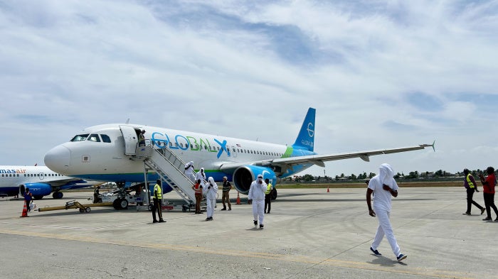 Haitians deported from the United States disembark from a charter flight at Cap-Haïtien International Airport, Haiti, August 27, 2026.