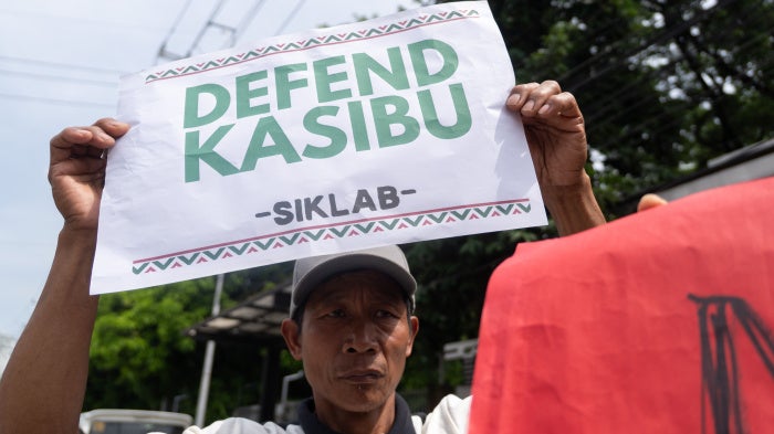 Indigenous residents from Nueva Vizcaya province protest outside the Mines and Geosciences Bureau and the Department of Environment and Natural Resources in Quezon City, Philippines, on July 13, 2026.