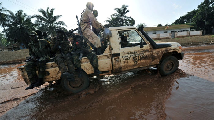 Seleka forces patrol a street of Bangui in a truck