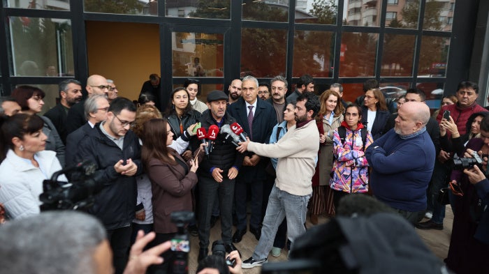 Halk TV general news coordinator Serhan Asker gives an interview to media after the government takeover of the channel, a police raid on the premises, and the announcement of an arrest warrant against its owner and 16 others. Halk TV, Istanbul, October 14, 2026.