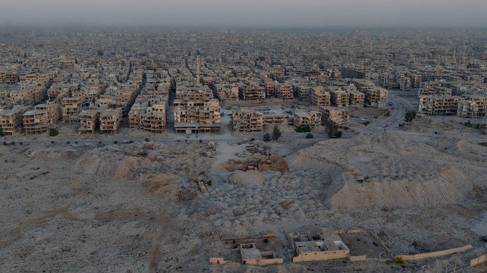 An aerial view of a damaged area of Damascus where the debris from collapsed buildings is being turned into sand, gravel, and bricks to reuse as construction materials to restore areas affected by Syria’s civil war, November 2, 2025. 
