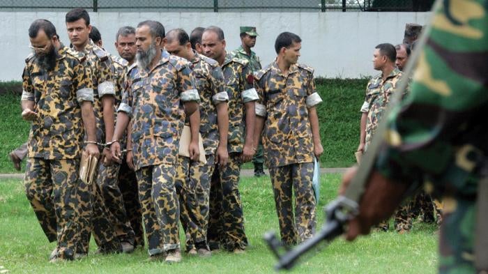 Members of Bangladesh Rifles (BDR) accused of mutiny are summoned for a hearing before a special court in Dhaka July 12, 2010.