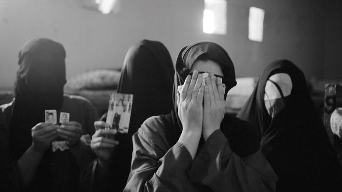 Women incarcerated in the Kadhimiyya women’s prison in 2006. Prior to 2009, Kadhimiyya was the only place in Baghdad where women charged with crimes were incarcerated. 