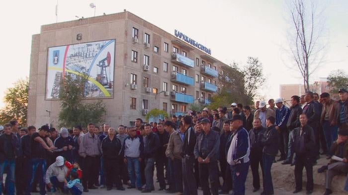 KarazhanbasMunai oil workers on strike outside company offices in Aktau, Kazakhstan in October 2011.