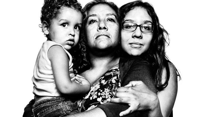 Melida Ruiz, a lawful permanent resident, pictured with her daughter, Mercedez Ruiz, and her grandson, Christopher Gonzalez.