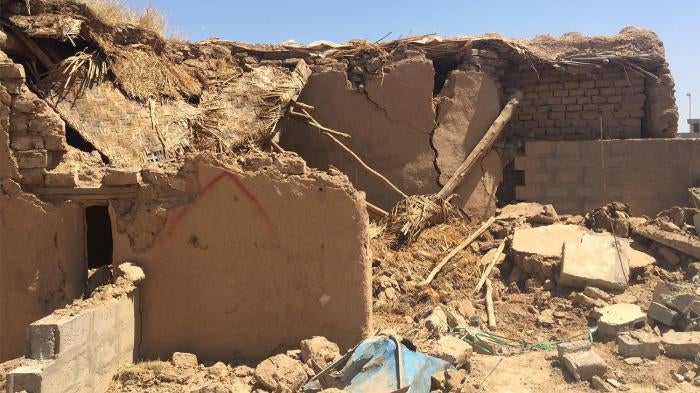 House marked with red “X” for destruction in Qarah Tappah in May 2016.