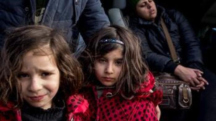 Two young Iranian sisters at the Idomeni border crossing between Greece and Macedonia. The border crossing is closed to all except those from Syria, Iraq, and Afghanistan who intend to seek asylum in Germany or Austria, stranding other asylum seekers and 