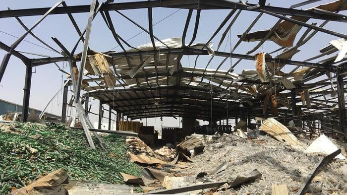 A picture showing a civilian factory destroyed in a Saudi-led Coalition airstrike in Yemen