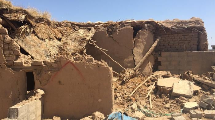 House marked with red “X” for destruction in Qarah Tappah in May 2016. 