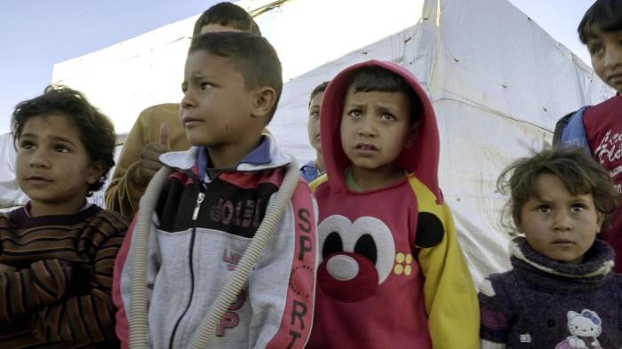 Syrian children in an informal refugee camp in the Bekaa Valley.