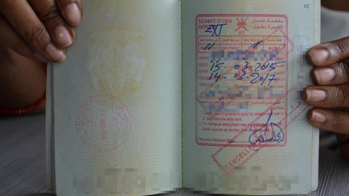 Employment visa from Oman in the passport of a former Tanzanian domestic worker. Dar es Salaam, Tanzania. 
