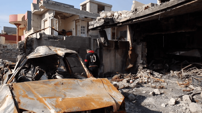 destroyed car in Mosul