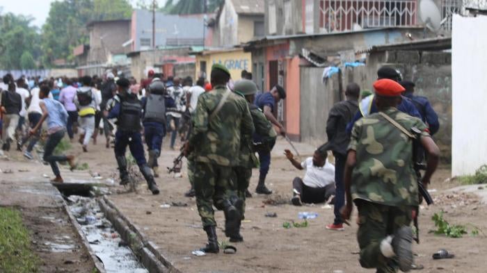 Security forces pursue peaceful protesters in Kinshasa, capital of the Democratic Republic of Congo, on December 31, 2017. © 2017 John Bompengo