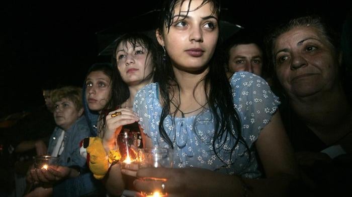 Церемония памяти в Гори, северо-западнее Тбилиси, спустя год после начала августовской войны 2008 г. между Грузией и Россией вокруг Южной Осетии. © 2008 REUTERS/David Mdzinarishvili