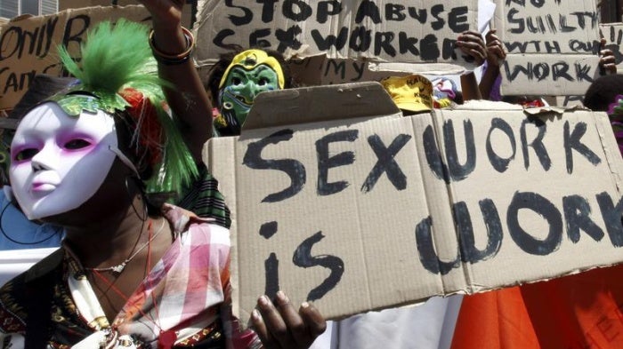 Sex workers wearing masks lead a march to mark International Sex Workers Rights Day in Johannesburg March 3, 2011