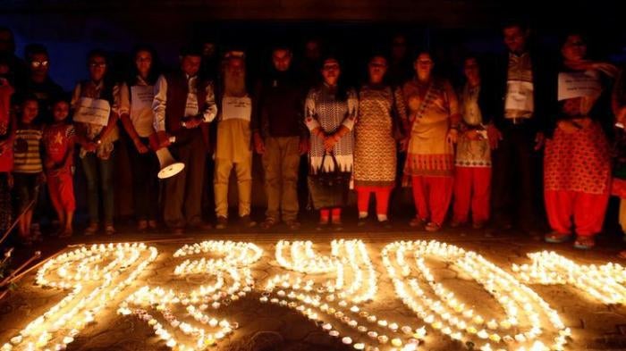 Activists hold an event in memory of people who were disappeared during Nepal’s decade-long civil war, Kathmandu, August 30, 2017.