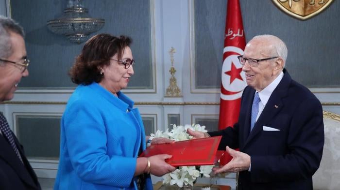 The president of the Commission on Individual Freedoms and Equality, Bochra bel Haj Hmida with President Béji Caid Essebsi during the handing of the Commission’s report. © 2018 Commission on Individual Freedom and Equality 