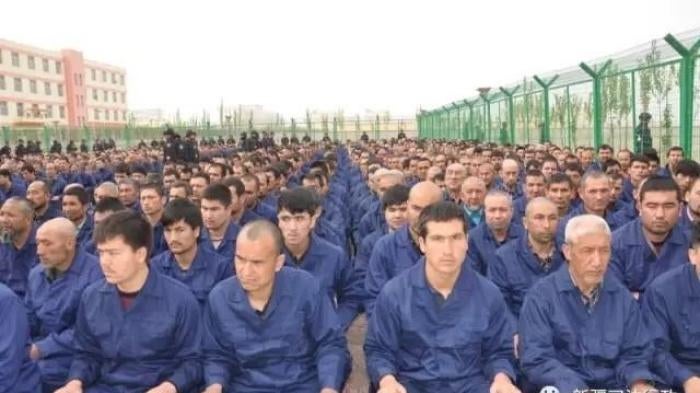 Government social media post in April 2017 shows detainees in a political education camp in Lop County, Hotan Prefecture, Xinjiang. 
