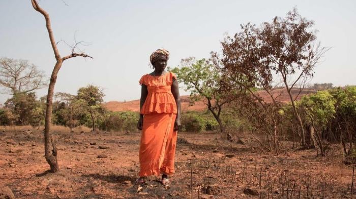 A woman in Lansanayah, a village 750 meters from a bauxite mine owned by La Société Minière de Boké consortium.