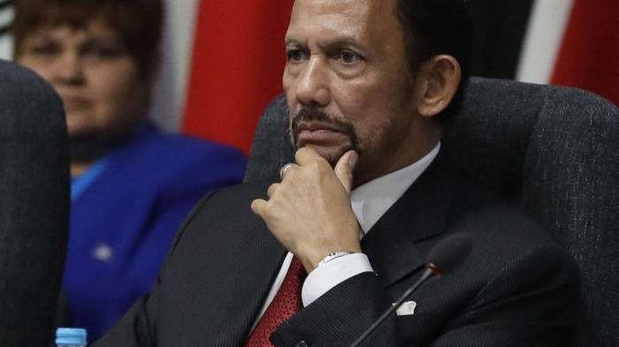The Sultan of Brunei Hassanal Bolkiah listens during the first executive session of the CHOGM summit at Lancaster House in London, Thursday, April 19, 2018. 