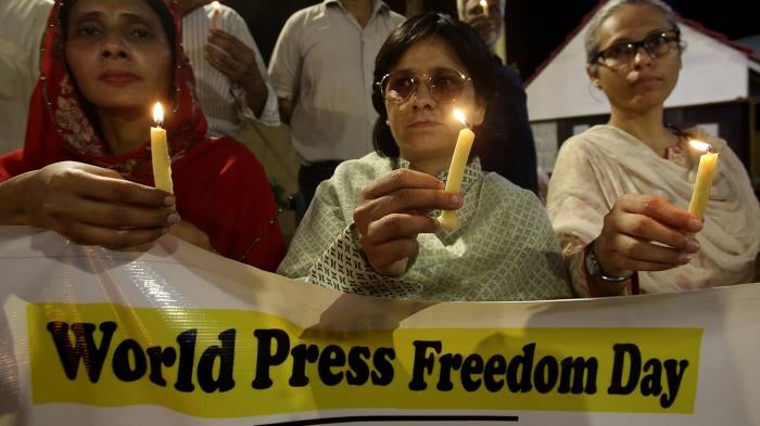 Pakistani journalists attend a candlelight vigil to observe World Press Freedom Day on May 3, 2019, in Karachi, Pakistan. © 2019 AP Photo/Fareed Khan