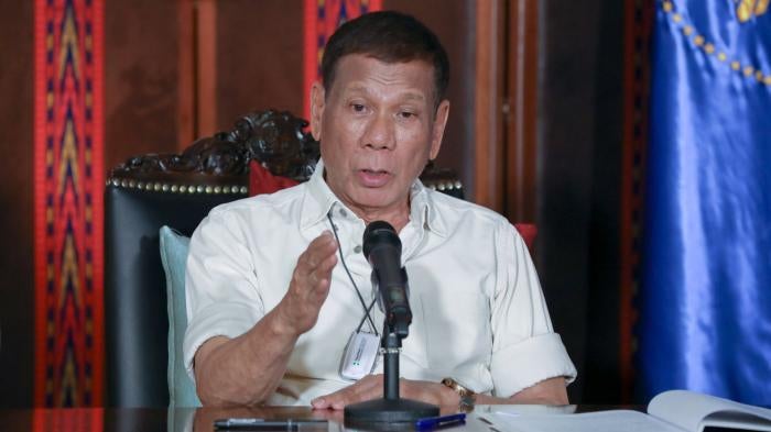 Philippine President Rodrigo Duterte speaks during a late night live broadcast in Malacanang, Manila, Philippines, April 3, 2020.