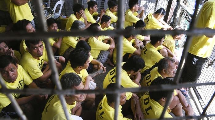 Inmates sitting in an overcrowded jail in Manila, Philippines, February 2019. 